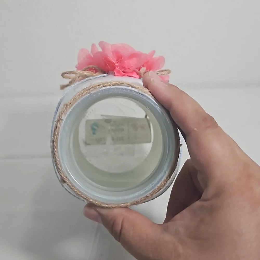 handmade white mason jar with floral blue ribbon and pink flower cross